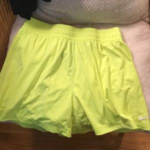 Yellow Nike athletic shorts
